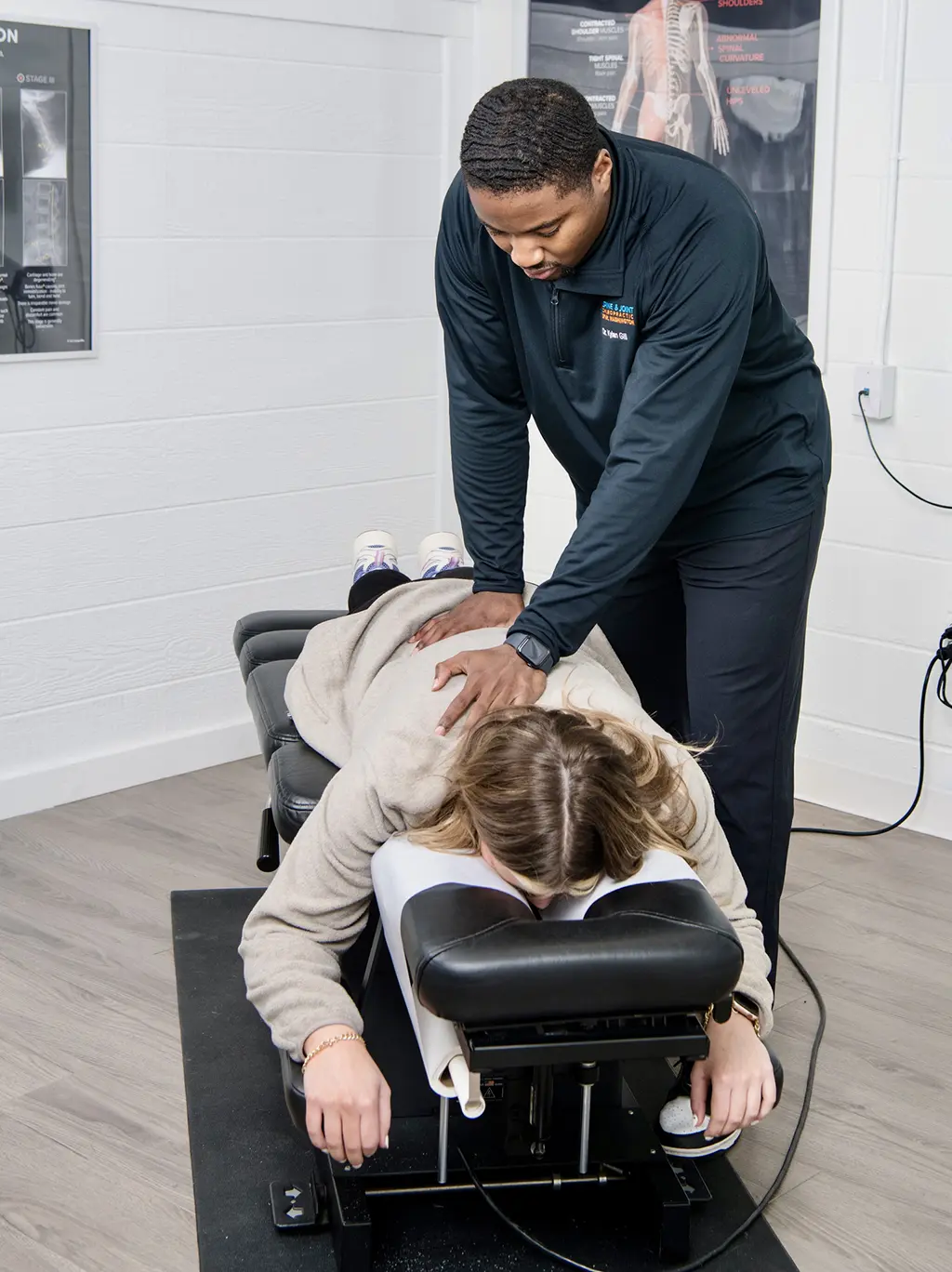 dr making an adjustment at Spine and Joint Chiropractor Office